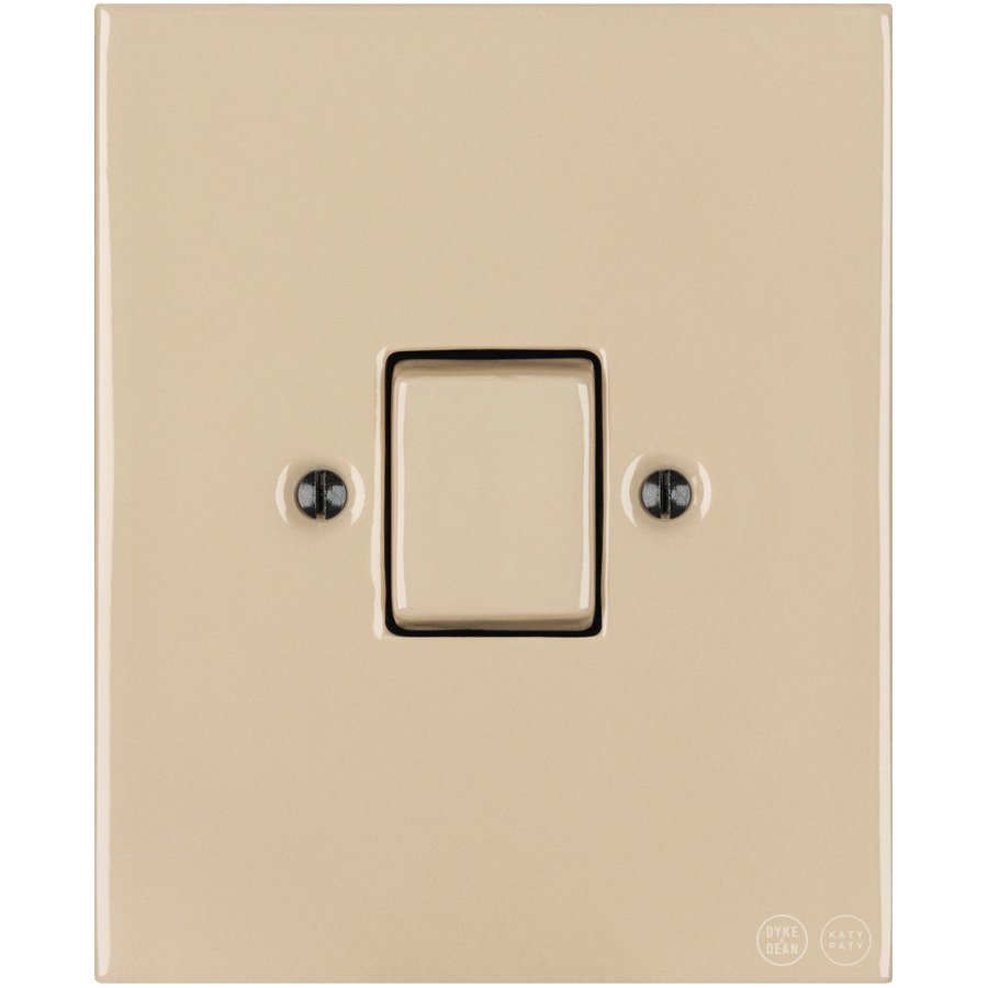 Sand porcelain plate wall light switch with large button by Katy Paty