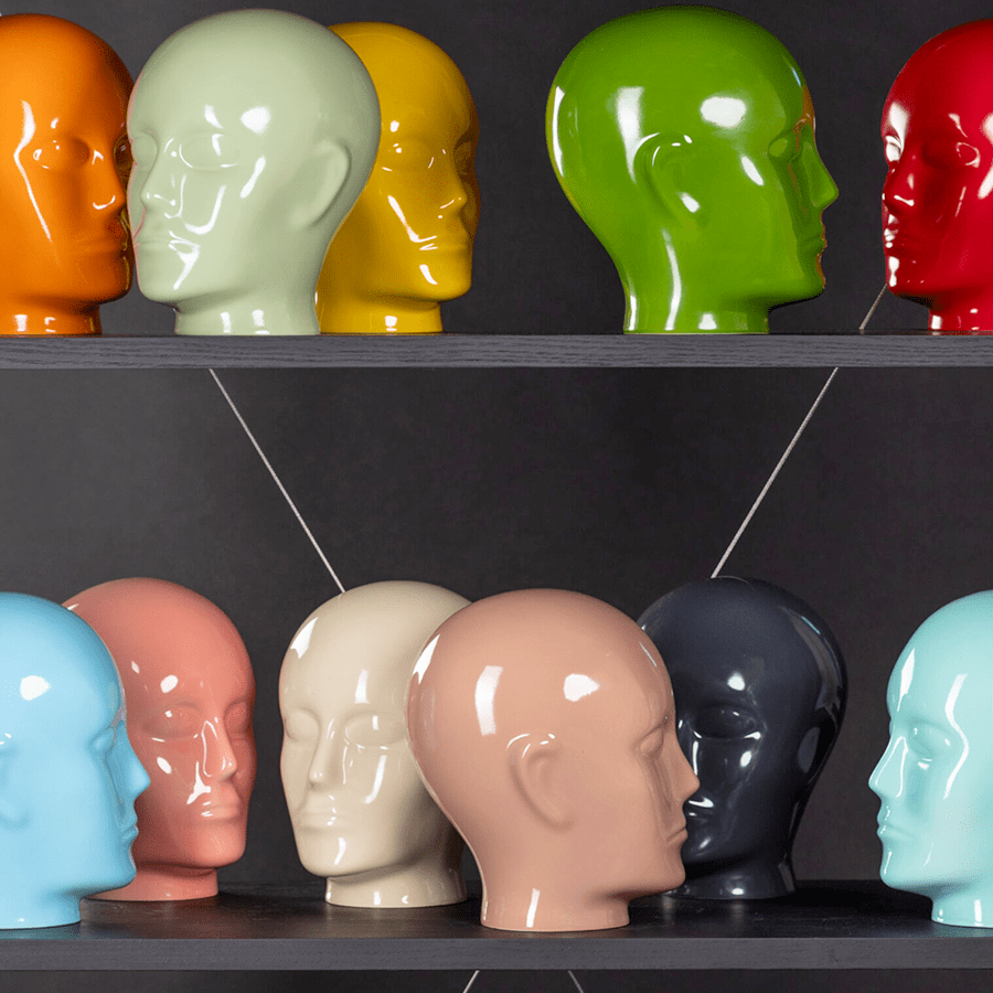 Glazed porcelain decorative head in a Katy Paty colour