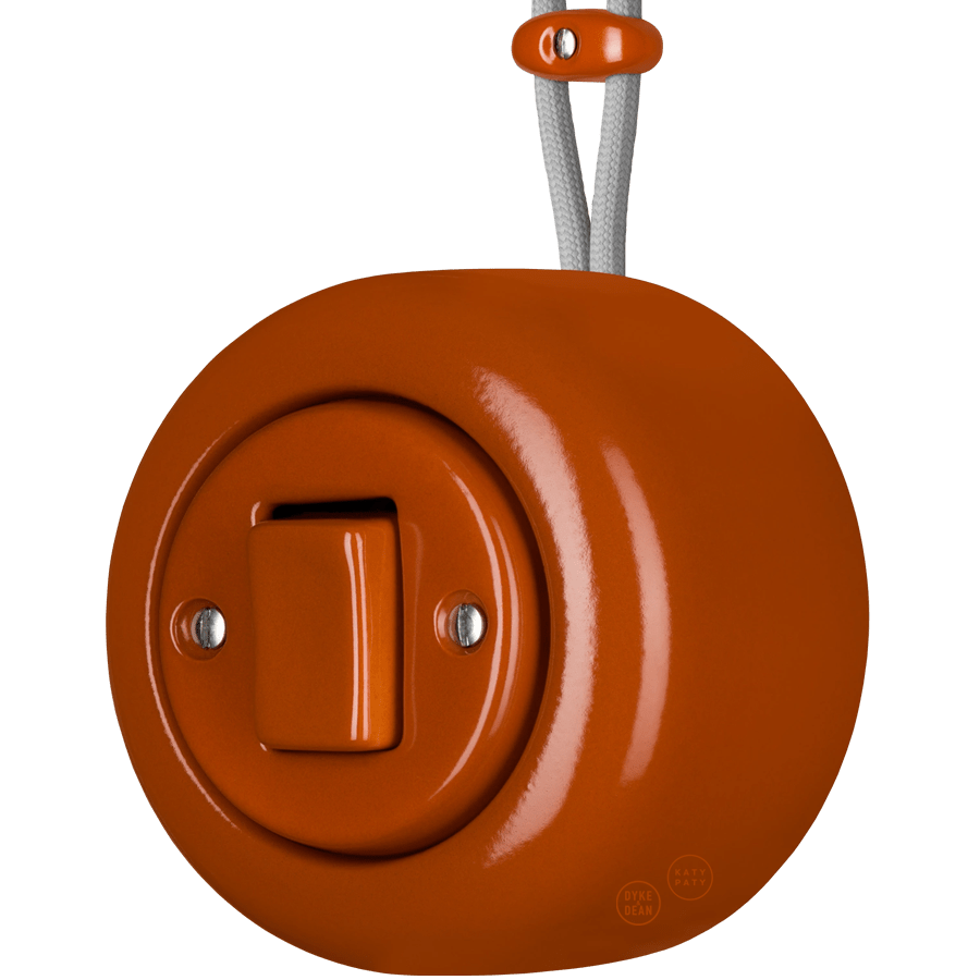 Brick Red round porcelain surface-mounted fat button light switch by Katy Paty