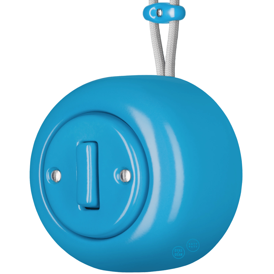 Azure round porcelain surface-mounted slim button switch by Katy Paty
