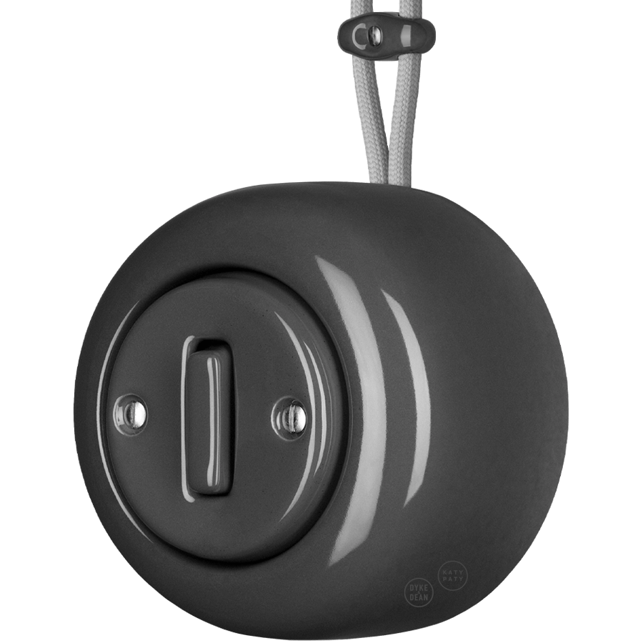 Dark Grey round porcelain surface-mounted slim button switch by Katy Paty