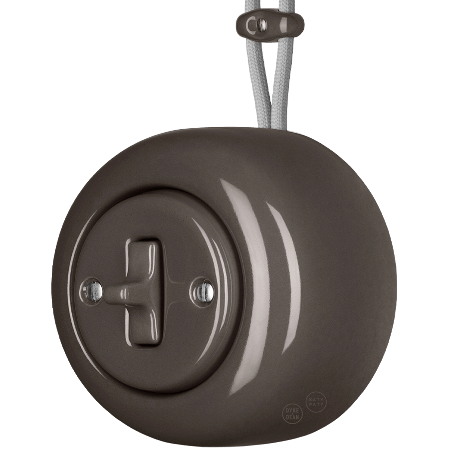 Brown round porcelain surface-mounted toggle switch by Katy Paty