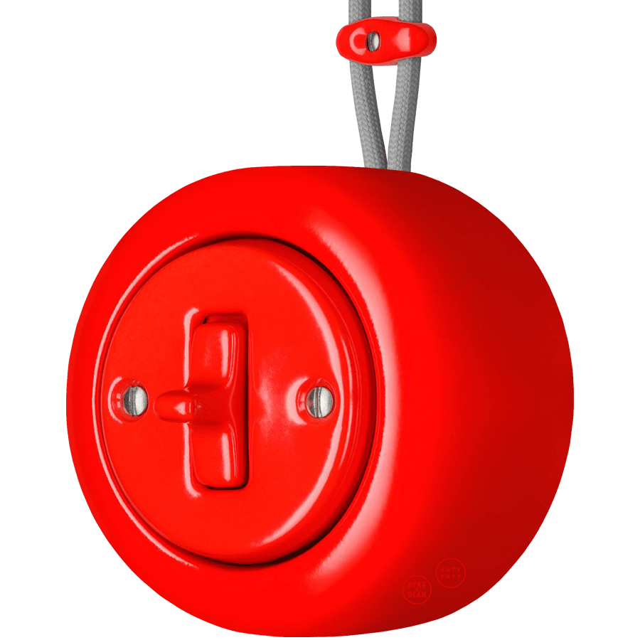 Red round porcelain surface-mounted toggle switch by Katy Paty