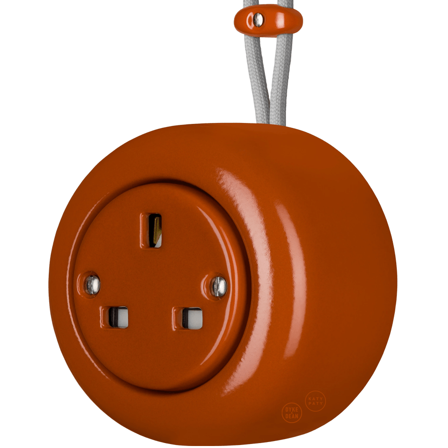 Brick Red round porcelain surface-mounted UK socket by Katy Paty