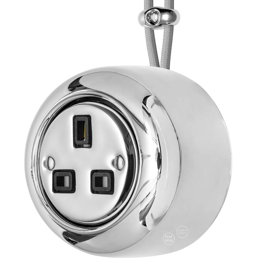 Chrome round porcelain surface-mounted UK socket by Katy Paty