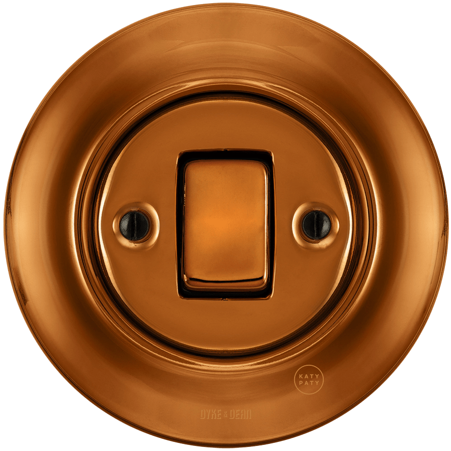 Bronze porcelain wall light switch with fat button by Katy Paty