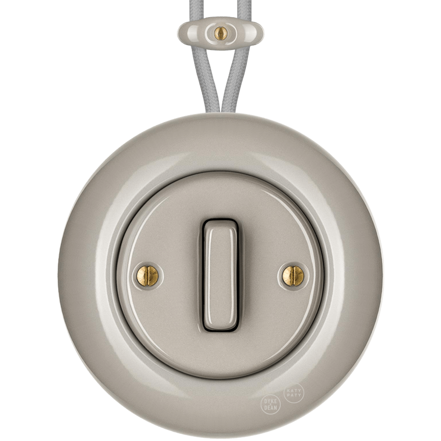 Cappuccino round porcelain surface-mounted slim button switch by Katy Paty