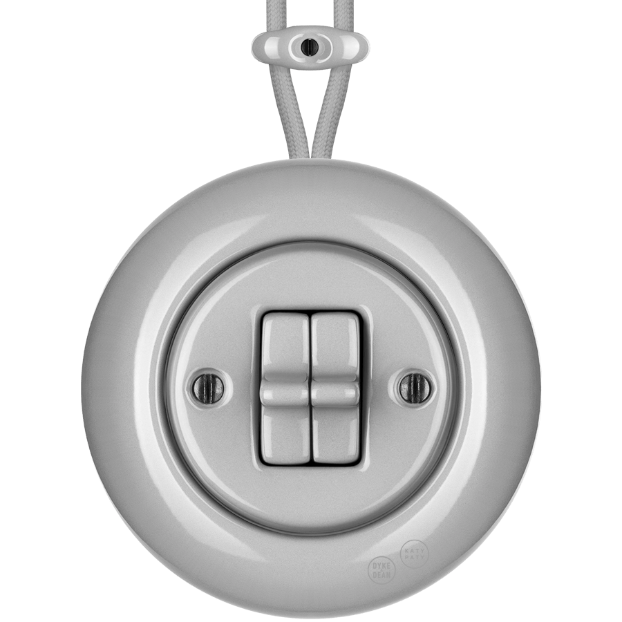 Grey round porcelain surface-mounted double toggle switch by Katy Paty