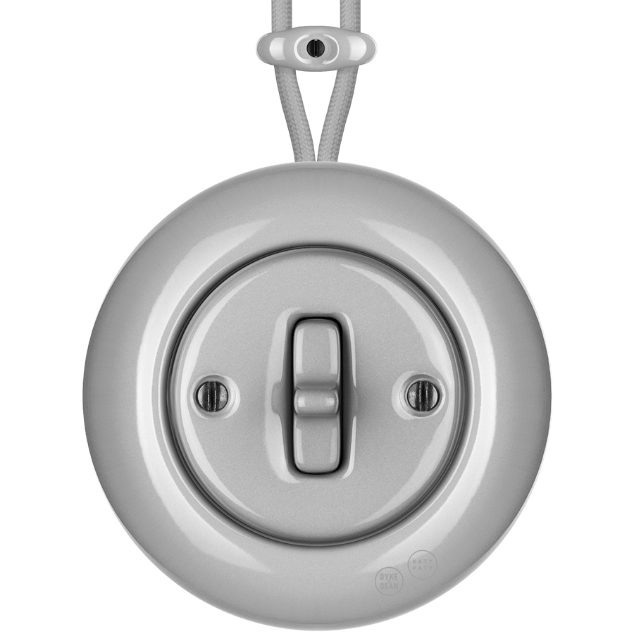 Grey round porcelain surface-mounted toggle switch by Katy Paty