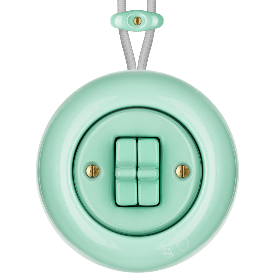 Mint round porcelain surface-mounted double toggle switch by Katy Paty