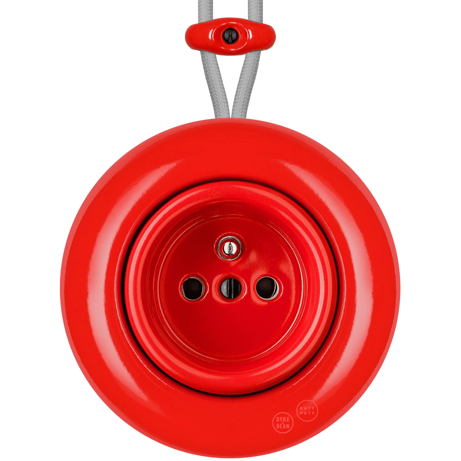 Red round porcelain surface-mounted 2-pin Euro socket by Katy Paty