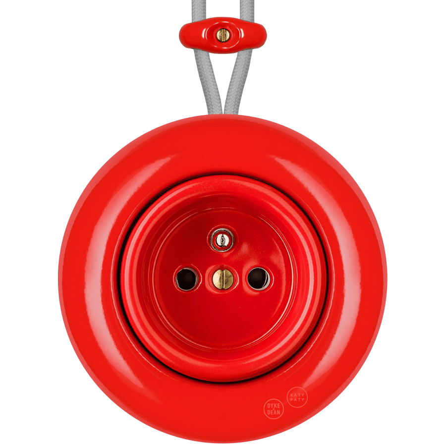 Red round porcelain surface-mounted 2-pin Euro socket by Katy Paty