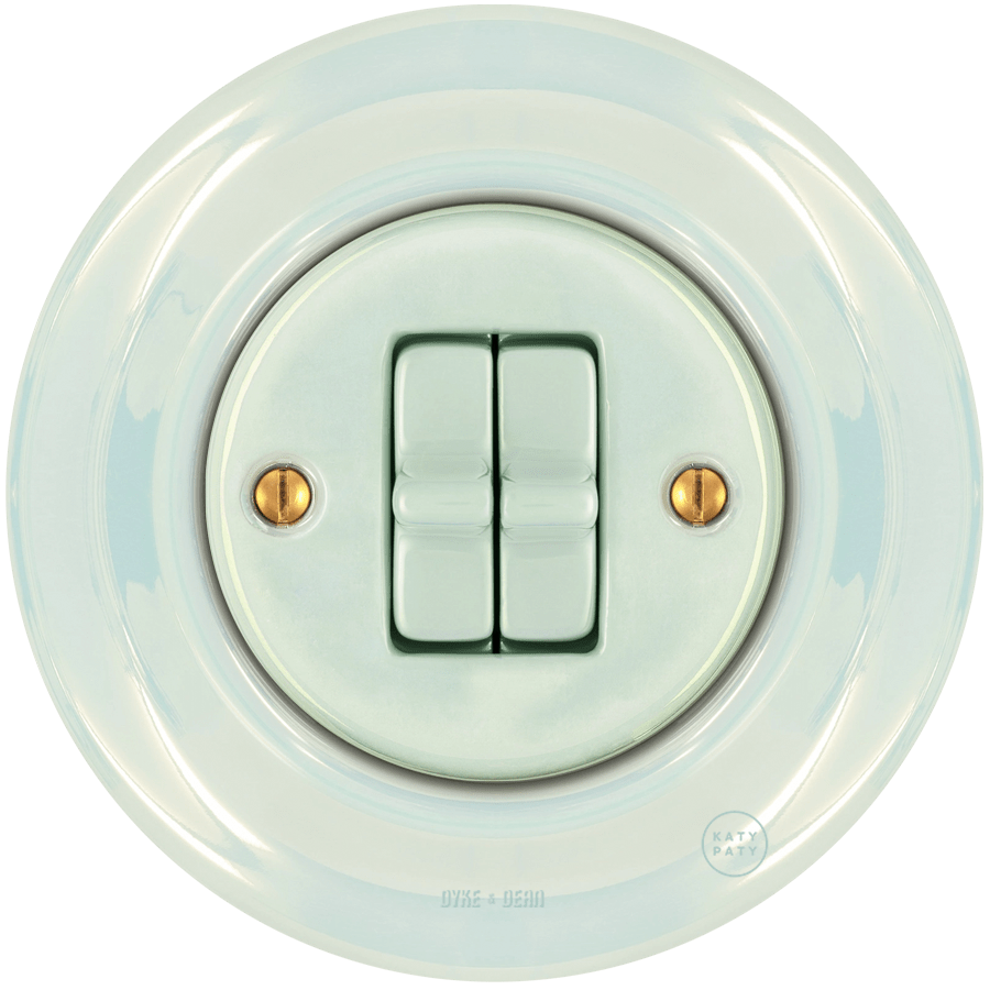 Concha porcelain two-gang toggle wall light switch by Katy Paty