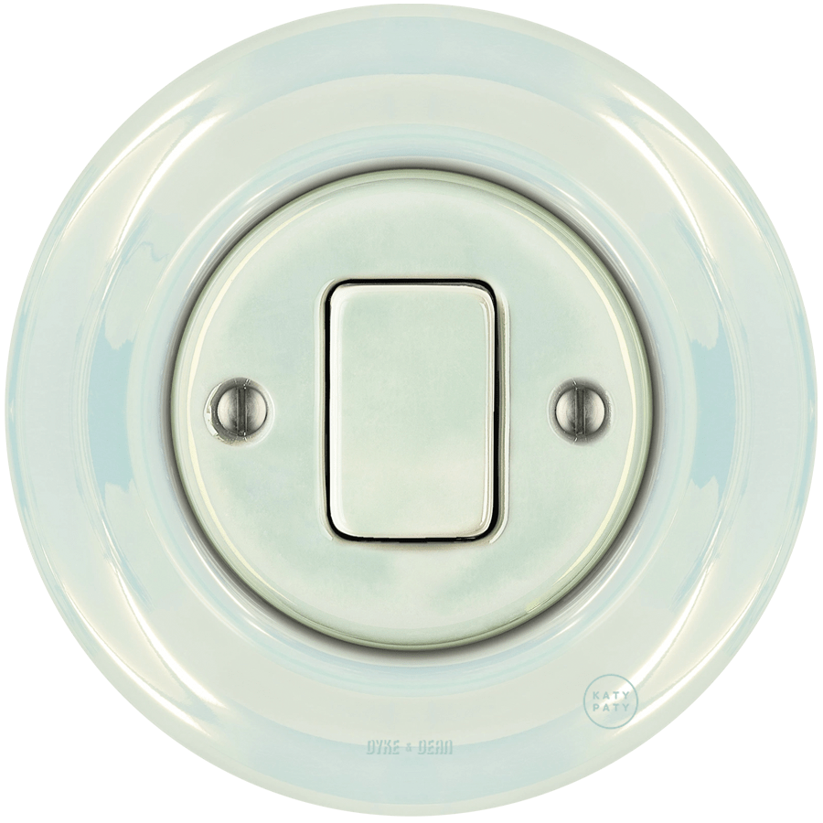 Concha porcelain wall light switch with fat button by Katy Paty