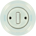 Concha porcelain wall light switch with slim button by Katy Paty