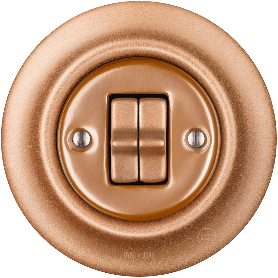 Copper porcelain two-gang toggle wall light switch by Katy Paty