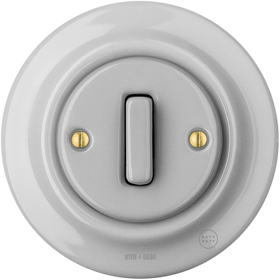 Grey porcelain wall light switch with slim button by Katy Paty