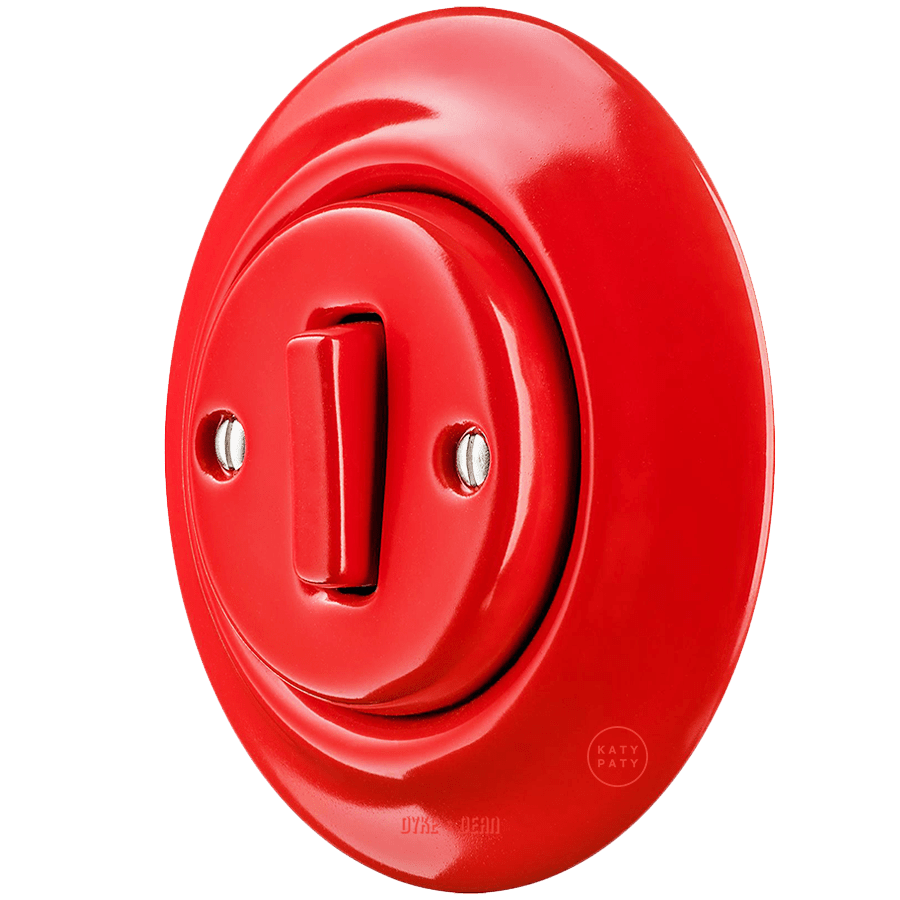 Red porcelain wall light switch with slim button by Katy Paty