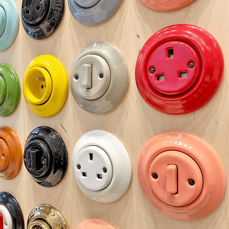 White porcelain 2-pin Euro wall socket by Katy Paty