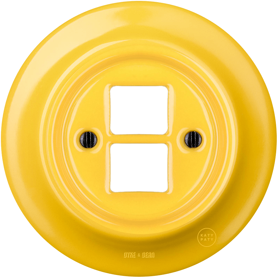 Yellow porcelain PC and USB data wall socket by Katy Paty
